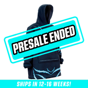 Navy blue hooded blanket with pixel art characters and light blue pixel patterns on sleeves and hem.