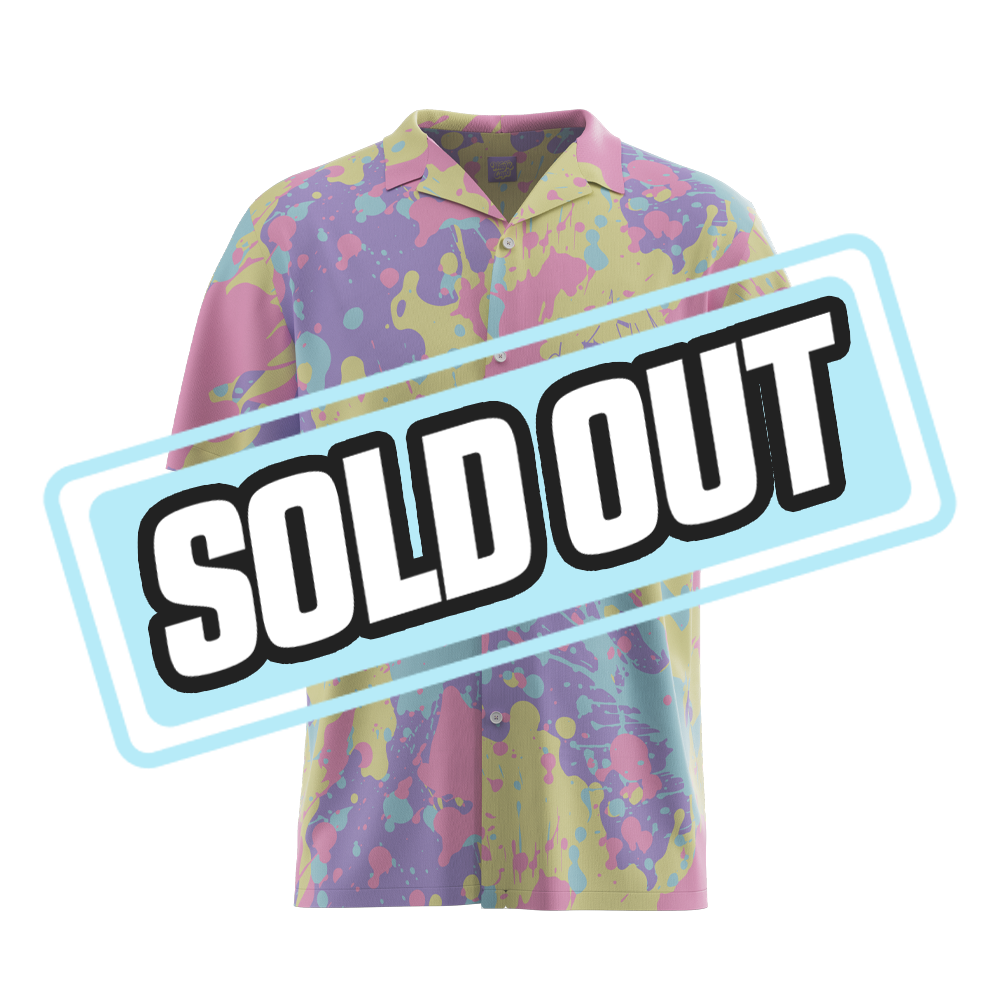 Short-sleeve button-up shirt with pastel pink, blue, yellow, and purple abstract splatter design.