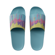 Light blue slides with yellow straps featuring pink and purple paint drip patterns across the top band.