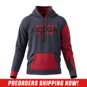 Close-up of a red and black anime-style character graphic on a black and red hoodie sleeve.